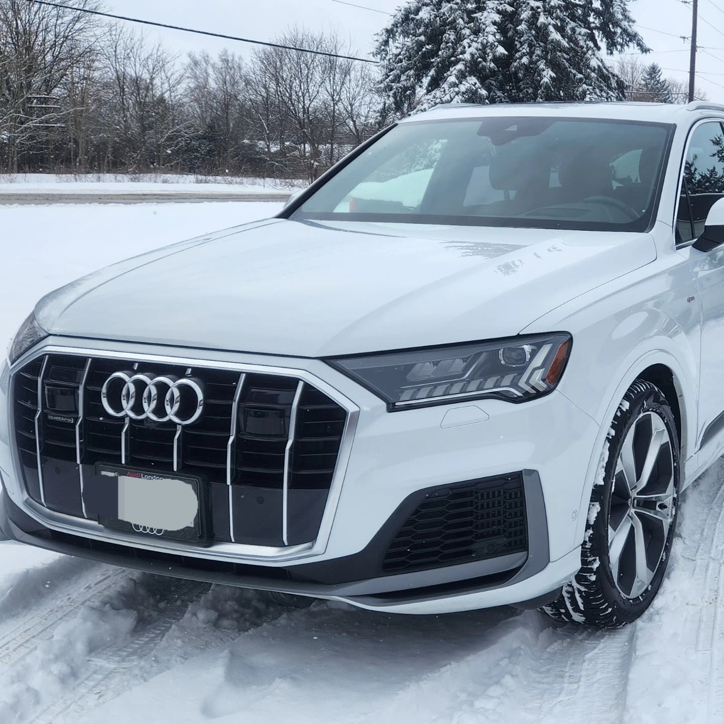 White Audi SUV — winter